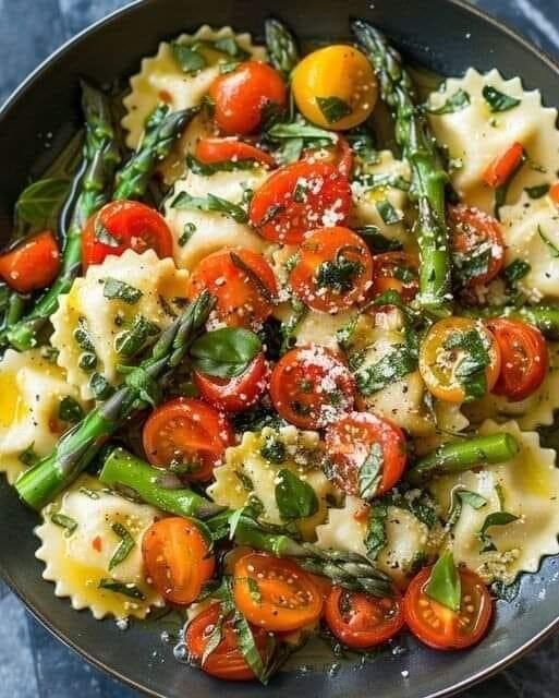 Ravioli With Tomatoes Asparagus Garlic and Herbs