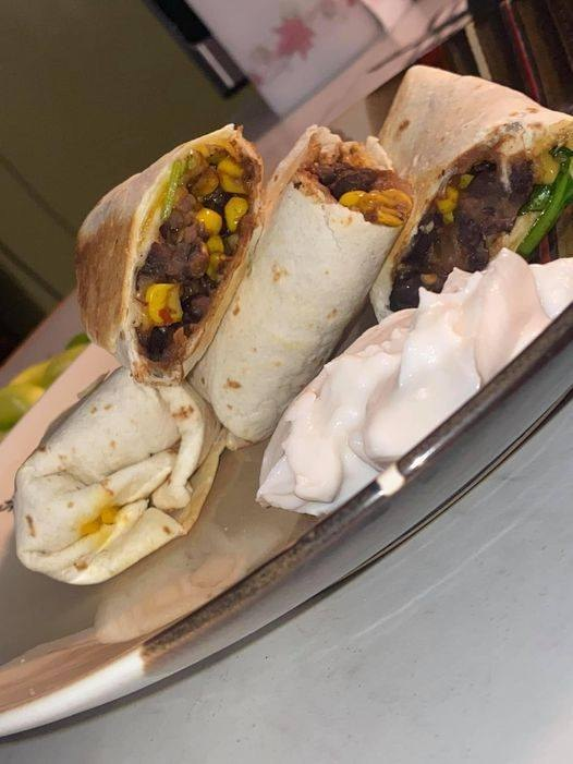 Vegan Black Bean Spinach and Corn Burrito with Plant-Based Sour Cream