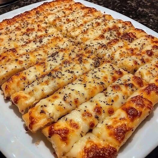 Cheesy Garlic Breadsticks Recipe –